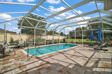 BOND PAID! STUNNING 3 BED / 2 BATH DESIGNER HOME WITH SALTWATER on The Links of Spruce Creek in Florida - for sale on GolfHomes.com, golf home, golf lot