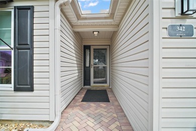 BOND PAID! STUNNING 3 BED / 2 BATH DESIGNER HOME WITH SALTWATER on The Links of Spruce Creek in Florida - for sale on GolfHomes.com, golf home, golf lot