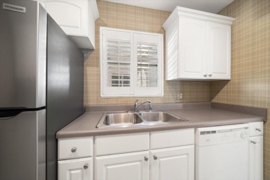 EASY FLORIDA LIVING AWAITS in this TOP FLOOR CONDO located in on Bayou Golf Club in Florida - for sale on GolfHomes.com, golf home, golf lot