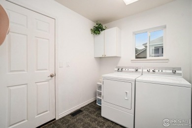 Enjoy the charm of shady, tree-lined streets as you arrive at on Pelican Lakes Golf and Country Club in Colorado - for sale on GolfHomes.com, golf home, golf lot