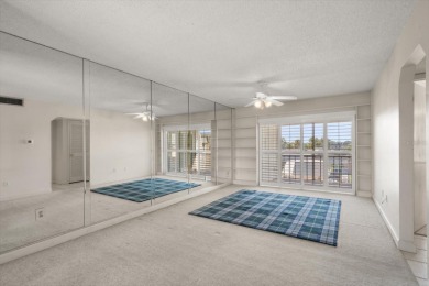 EASY FLORIDA LIVING AWAITS in this TOP FLOOR CONDO located in on Bayou Golf Club in Florida - for sale on GolfHomes.com, golf home, golf lot