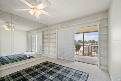 EASY FLORIDA LIVING AWAITS in this TOP FLOOR CONDO located in on Bayou Golf Club in Florida - for sale on GolfHomes.com, golf home, golf lot