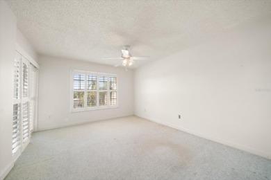 EASY FLORIDA LIVING AWAITS in this TOP FLOOR CONDO located in on Bayou Golf Club in Florida - for sale on GolfHomes.com, golf home, golf lot
