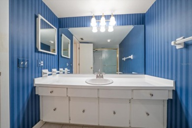EASY FLORIDA LIVING AWAITS in this TOP FLOOR CONDO located in on Bayou Golf Club in Florida - for sale on GolfHomes.com, golf home, golf lot