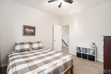 Enjoy the charm of shady, tree-lined streets as you arrive at on Pelican Lakes Golf and Country Club in Colorado - for sale on GolfHomes.com, golf home, golf lot