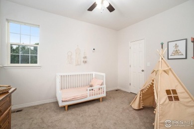 Enjoy the charm of shady, tree-lined streets as you arrive at on Pelican Lakes Golf and Country Club in Colorado - for sale on GolfHomes.com, golf home, golf lot