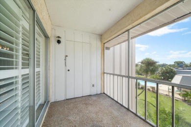 EASY FLORIDA LIVING AWAITS in this TOP FLOOR CONDO located in on Bayou Golf Club in Florida - for sale on GolfHomes.com, golf home, golf lot
