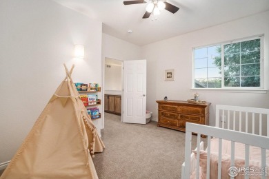 Enjoy the charm of shady, tree-lined streets as you arrive at on Pelican Lakes Golf and Country Club in Colorado - for sale on GolfHomes.com, golf home, golf lot
