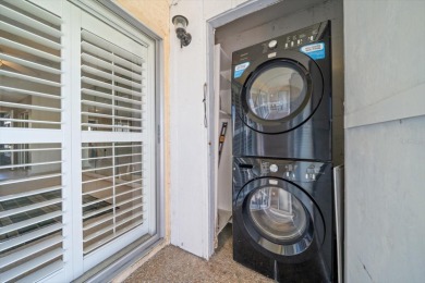 EASY FLORIDA LIVING AWAITS in this TOP FLOOR CONDO located in on Bayou Golf Club in Florida - for sale on GolfHomes.com, golf home, golf lot