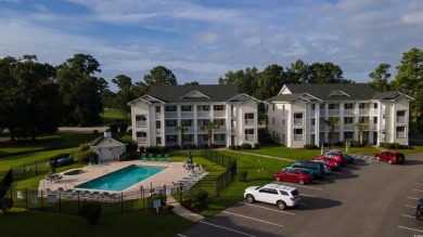 This move-in ready third-floor condo in the River Oaks community on River Oaks Golf Plantation  in South Carolina - for sale on GolfHomes.com, golf home, golf lot
