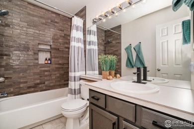 Enjoy the charm of shady, tree-lined streets as you arrive at on Pelican Lakes Golf and Country Club in Colorado - for sale on GolfHomes.com, golf home, golf lot