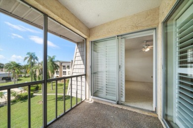 EASY FLORIDA LIVING AWAITS in this TOP FLOOR CONDO located in on Bayou Golf Club in Florida - for sale on GolfHomes.com, golf home, golf lot