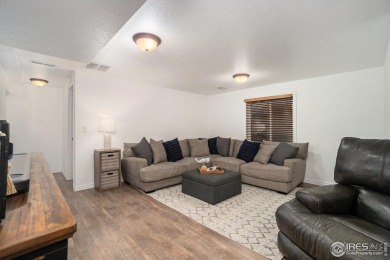 Enjoy the charm of shady, tree-lined streets as you arrive at on Pelican Lakes Golf and Country Club in Colorado - for sale on GolfHomes.com, golf home, golf lot