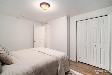 Enjoy the charm of shady, tree-lined streets as you arrive at on Pelican Lakes Golf and Country Club in Colorado - for sale on GolfHomes.com, golf home, golf lot