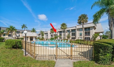 EASY FLORIDA LIVING AWAITS in this TOP FLOOR CONDO located in on Bayou Golf Club in Florida - for sale on GolfHomes.com, golf home, golf lot