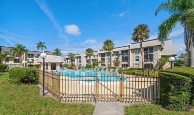 EASY FLORIDA LIVING AWAITS in this TOP FLOOR CONDO located in on Bayou Golf Club in Florida - for sale on GolfHomes.com, golf home, golf lot