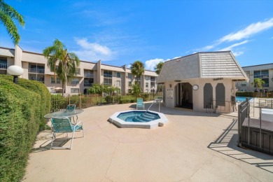 EASY FLORIDA LIVING AWAITS in this TOP FLOOR CONDO located in on Bayou Golf Club in Florida - for sale on GolfHomes.com, golf home, golf lot