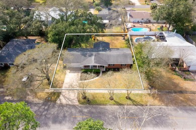 Just a short walk to Kenwood Elementary School sits this updated on Fort Walton Beach Golf Course in Florida - for sale on GolfHomes.com, golf home, golf lot