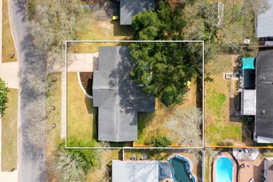 Just a short walk to Kenwood Elementary School sits this updated on Fort Walton Beach Golf Course in Florida - for sale on GolfHomes.com, golf home, golf lot