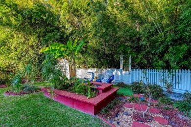 Set among majestic trees and lush landscaping in the highly on Snee Farm Country Club in South Carolina - for sale on GolfHomes.com, golf home, golf lot