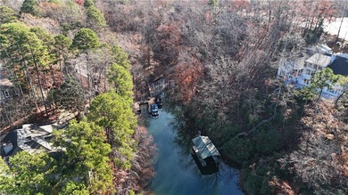 Embrace lake life at Lake Keowee with this exceptional on Keowee Key Golf and Country Club in South Carolina - for sale on GolfHomes.com, golf home, golf lot