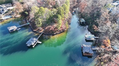 Embrace lake life at Lake Keowee with this exceptional on Keowee Key Golf and Country Club in South Carolina - for sale on GolfHomes.com, golf home, golf lot