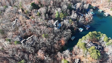 Embrace lake life at Lake Keowee with this exceptional on Keowee Key Golf and Country Club in South Carolina - for sale on GolfHomes.com, golf home, golf lot