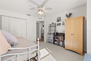 Discover the perfect blend of charm, comfort, and resort-style on Royal Oaks Golf Club in Florida - for sale on GolfHomes.com, golf home, golf lot