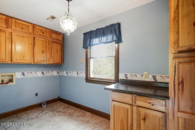 Tucked along the scenic fairways of one of Elizabethtown's on Elizabethtown Country Club in Kentucky - for sale on GolfHomes.com, golf home, golf lot