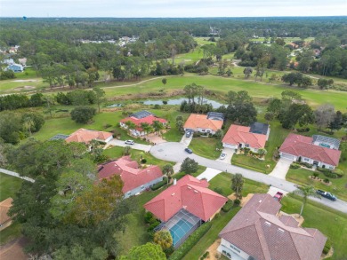 Welcome to your dream home in the exclusive Sutton Place on The Grand Club - Pine Lakes Course in Florida - for sale on GolfHomes.com, golf home, golf lot