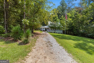 Nestled in the desirable Turtle Cove subdivision, this charming on Turtle Cove Golf Course in Georgia - for sale on GolfHomes.com, golf home, golf lot