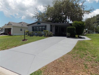 Location, Location, Location, in the heart of Orange Blossom on Silver Lake Executive Golf Course in Florida - for sale on GolfHomes.com, golf home, golf lot