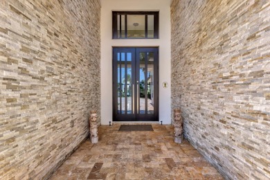 Welcome to waterfront living, in prestigious Frenchman's Creek on Frenchmans Creek Country Club in Florida - for sale on GolfHomes.com, golf home, golf lot