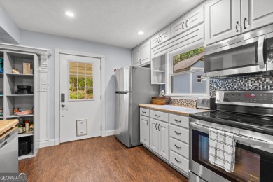 Nestled in the desirable Turtle Cove subdivision, this charming on Turtle Cove Golf Course in Georgia - for sale on GolfHomes.com, golf home, golf lot