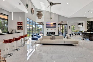 Welcome to waterfront living, in prestigious Frenchman's Creek on Frenchmans Creek Country Club in Florida - for sale on GolfHomes.com, golf home, golf lot