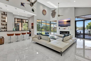 Welcome to waterfront living, in prestigious Frenchman's Creek on Frenchmans Creek Country Club in Florida - for sale on GolfHomes.com, golf home, golf lot