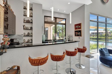 Welcome to waterfront living, in prestigious Frenchman's Creek on Frenchmans Creek Country Club in Florida - for sale on GolfHomes.com, golf home, golf lot