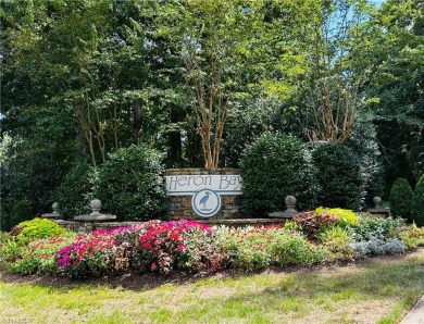 Discover the perfect place to build your dream home in the Heron on Old North State Club at Uwharrie Point Golf community in North Carolina - for sale on GolfHomes.com, golf home, golf lot