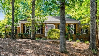 Discover Timeless Elegance and Comfort in this Custom Built on Forest Oaks Country Club in North Carolina - for sale on GolfHomes.com, golf home, golf lot