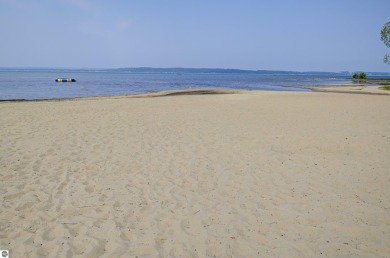 Welcome to the beautiful beach and towering pines of The Shores on Grand Traverse Resort and Spa in Michigan - for sale on GolfHomes.com, golf home, golf lot