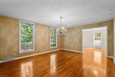 Discover Timeless Elegance and Comfort in this Custom Built on Forest Oaks Country Club in North Carolina - for sale on GolfHomes.com, golf home, golf lot