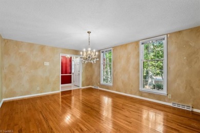 Discover Timeless Elegance and Comfort in this Custom Built on Forest Oaks Country Club in North Carolina - for sale on GolfHomes.com, golf home, golf lot