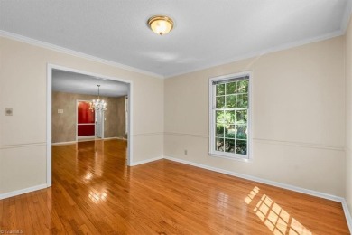 Discover Timeless Elegance and Comfort in this Custom Built on Forest Oaks Country Club in North Carolina - for sale on GolfHomes.com, golf home, golf lot