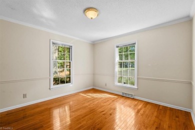 Discover Timeless Elegance and Comfort in this Custom Built on Forest Oaks Country Club in North Carolina - for sale on GolfHomes.com, golf home, golf lot