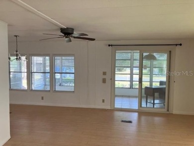 Welcome to this 2-bedroom, 2-bath manufactured home nestled in on Orange Blossom Hills Golf and Country Club in Florida - for sale on GolfHomes.com, golf home, golf lot