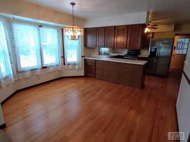 Just in time for the holidays, this beautiful and spacious home on Gladwin Heights Golf Course in Michigan - for sale on GolfHomes.com, golf home, golf lot