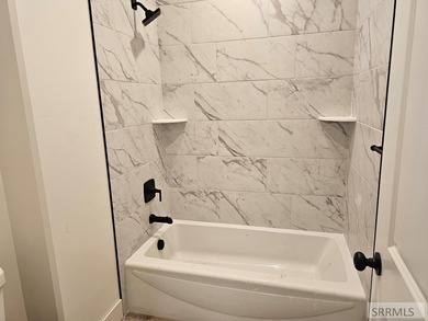 The cottage planned by Odyssey Homes is a perfect blend of style on Sand Creek Golf Course in ID - for sale on GolfHomes.com, golf home, golf lot