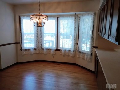 Just in time for the holidays, this beautiful and spacious home on Gladwin Heights Golf Course in Michigan - for sale on GolfHomes.com, golf home, golf lot