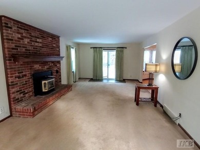 Just in time for the holidays, this beautiful and spacious home on Gladwin Heights Golf Course in Michigan - for sale on GolfHomes.com, golf home, golf lot