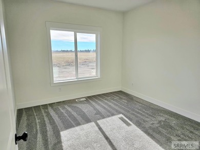 The cottage planned by Odyssey Homes is a perfect blend of style on Sand Creek Golf Course in ID - for sale on GolfHomes.com, golf home, golf lot